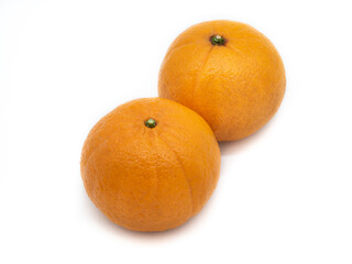 Fresh organic orange fruit  on a white background.