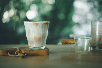 Dirty coffee menu, that is  between iced milk at the bottom of the glass and shot espresso top