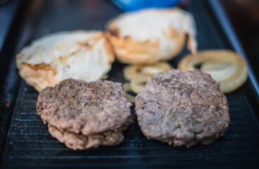 
Minced meat slices and grilled for picnic burgers.