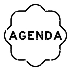 Grunge black agenda word rubber seal stamp on white background