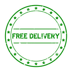 Grunge green free delivery word round rubber seal stamp on white background