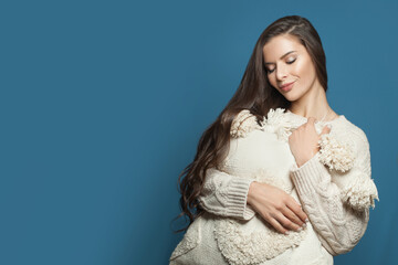 Resting woman with white pillow on blue banner background