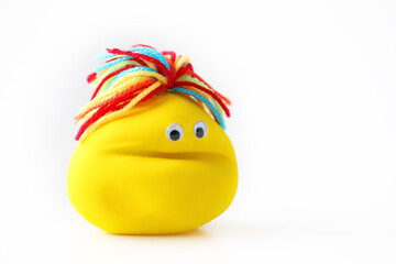 Cute homemade balloon puppet isolated on white background