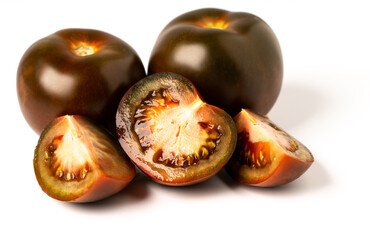 Kumato close-up. Fresh ripe kumats isolated on white background.