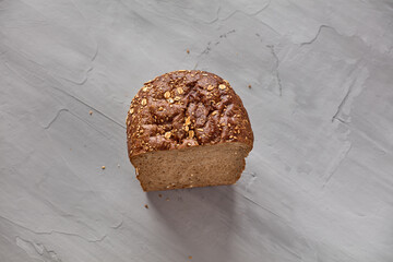 Loaf of bread. Grey background, copy space.