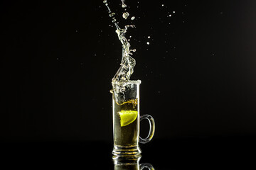 Mexican tequila with lime on black background. space for text. concept luxury drink. Alcoholic...