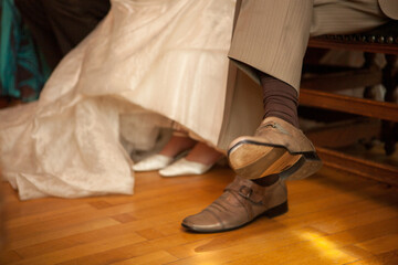 Bride and Groom Feet in Wedding Marriage Ceremony. High quality photo