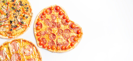 three different kinds of pizzas