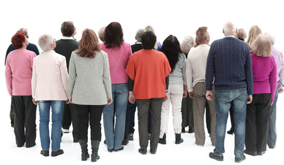 Rear view of a casual group of people looking on blank - Powered by Adobe