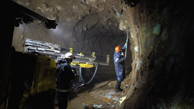 A miner removes chips in the mine.