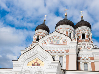 Fototapeta na wymiar Fragment of domes of Alexander Nevsky Cathedral in Old town of Tallinn, Estonia, Europe