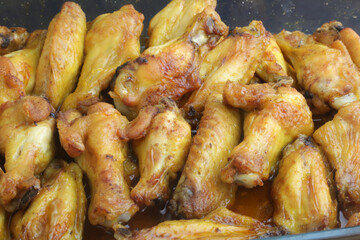 cooked chicken wings as fast food