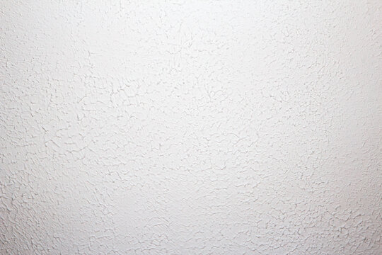 Artex ceiling cracking and breaking on the plaster board joins. Artex surface coating was a popular decorating choice during the 1970's and has since fallen out of favour in home renovations.
