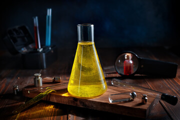 clear yellow liquid in a chemical flask. Science, chemistry, experiments