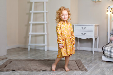 Little girl in a yellow dress