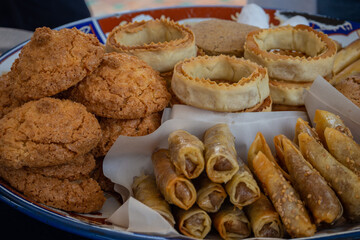 Tasty pastries offered in a terrace near the Andalusian Garden, Rabat, Morocco.