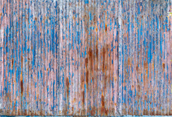 Rusted galvanized blue iron plate. Old rusty zinc sheet wall.