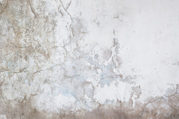 Old surface white concrete wall. The old white plaster wall has stains.