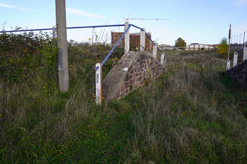 former abandoned and overgrown sports field