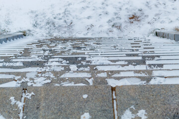 Stone Stairs Going Downward Covered With Snow