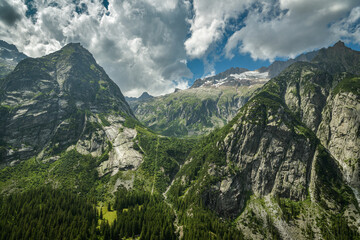 Fototapeta na wymiar View on majestic high peaks of Swiss Alps around Grimselpass