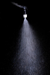 Water spray fog on black background