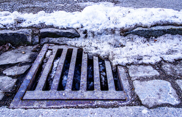 old manhole at a street