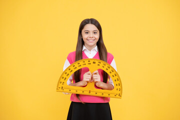 Geometry favorite subject. concept of education. measure the size. child with protractor.