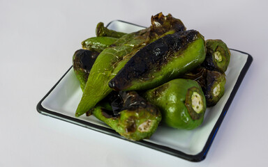 Roasted green chili peppers in a small-plate tapas