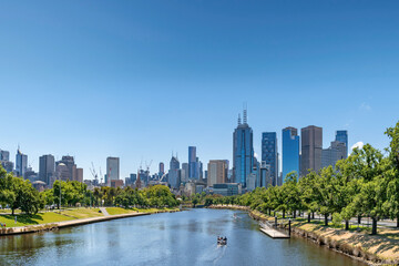 Fototapeta na wymiar Melbourne, Australia: January 17th, 2021: A modern cityscape with office corporate buildings and skyscrapers, Melbourne, Australia