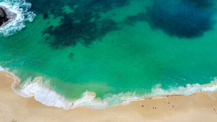 Top view of the most famous beach in Bali, Indonesia, Kelinkin Beach at Nusa Penida Island with beautiful greenish water. Bali Top tourist destinations
