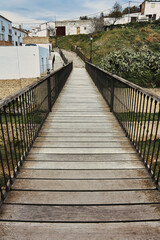 wooden bridge in the town of Setenil de las Bodegas, one of the most beautiful white villages in Andalusia, Spain