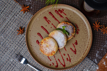 cheesecakes with jam on plate