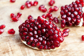 red and ripe pomegranate with juicy grains