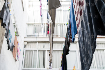 Obraz premium National flag hanging on rope with clothes