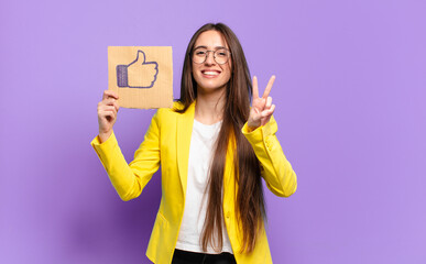 tty businesswoman holding a social media like symbol