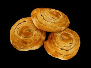 three buns on a black background