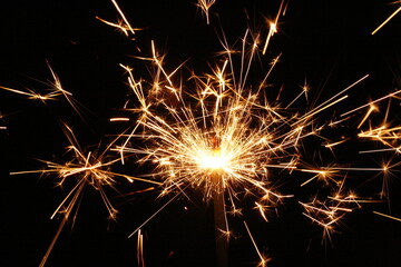 New Year's firework sparkler in the dark