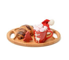 baked croissant and red ceramic cup with cocoa and marshmallows