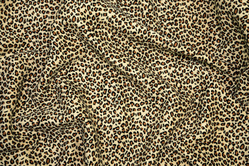 Fleece warm synthetic fabric with leopard animal print