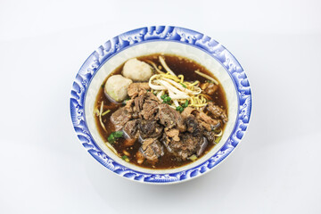 Thai boat noodles is Thailand's most famous noodles soup,Thai Boat noodles soup or Guay tiew reua ,Rice noodles thicken soup with stewed pork and pork ball, Braised pork and liver pork, 