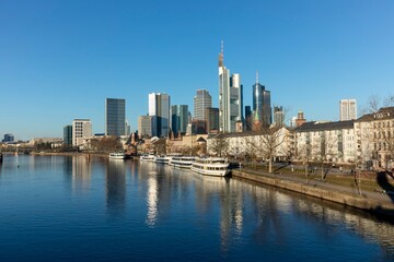 Fototapeta na wymiar sunrise view to skyline of Frankfurt with river Main