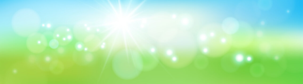 Abstract defocused nature background with blue and green blurred bokeh circles. Summer sun with light rays. Eps10