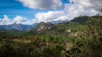Fototapeta na wymiar Beautiful view to a valley and the mountains of Bavella, Corse, France