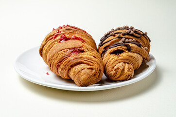 Croissants with strawberries and chocolate. High quality photo