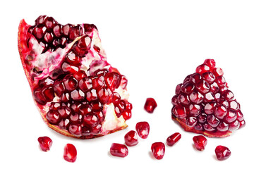 Garnet. Fruit of a juicy pomegranate in a cut.