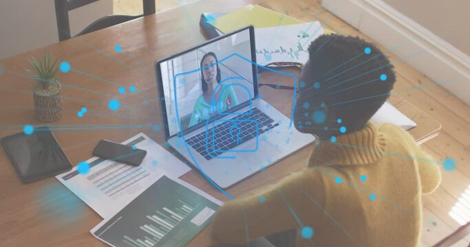 Animation of network of connection digital padlock icon over woman using laptop on video call in bac