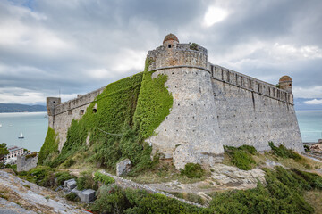 Fototapeta na wymiar Beautiful views of Porto Venere: Doria Castle (12th century) walls with seascape background
