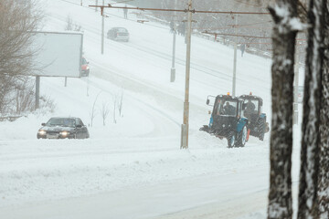 deep snowdrifts in the park. a strong cyclone hit the city. there was a lot of snow in the winter