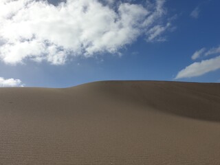 Fototapeta na wymiar Dune and Clouds